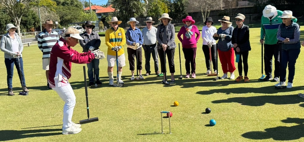 Croquet Coaching Session on the Lawn